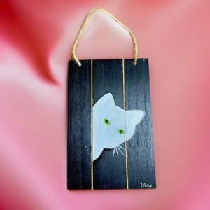 Hand crafted white cat green eyes painting black painted wood with rope hanger